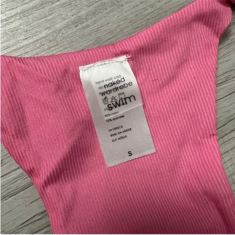NEW NAKED WARDROBE Pink Ribbed Racerback Bra Top
Size Small - Picture 9 of 12